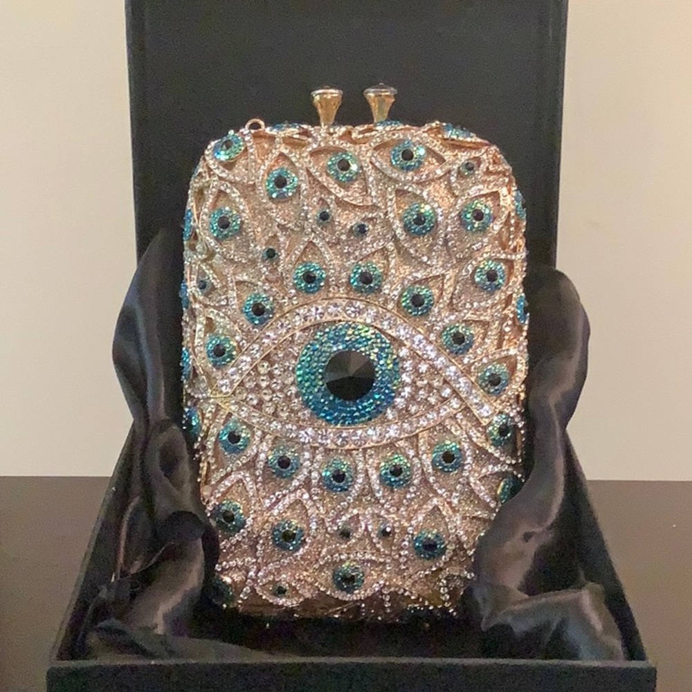 Gorgeous peacock eyespot bedazzled clutch